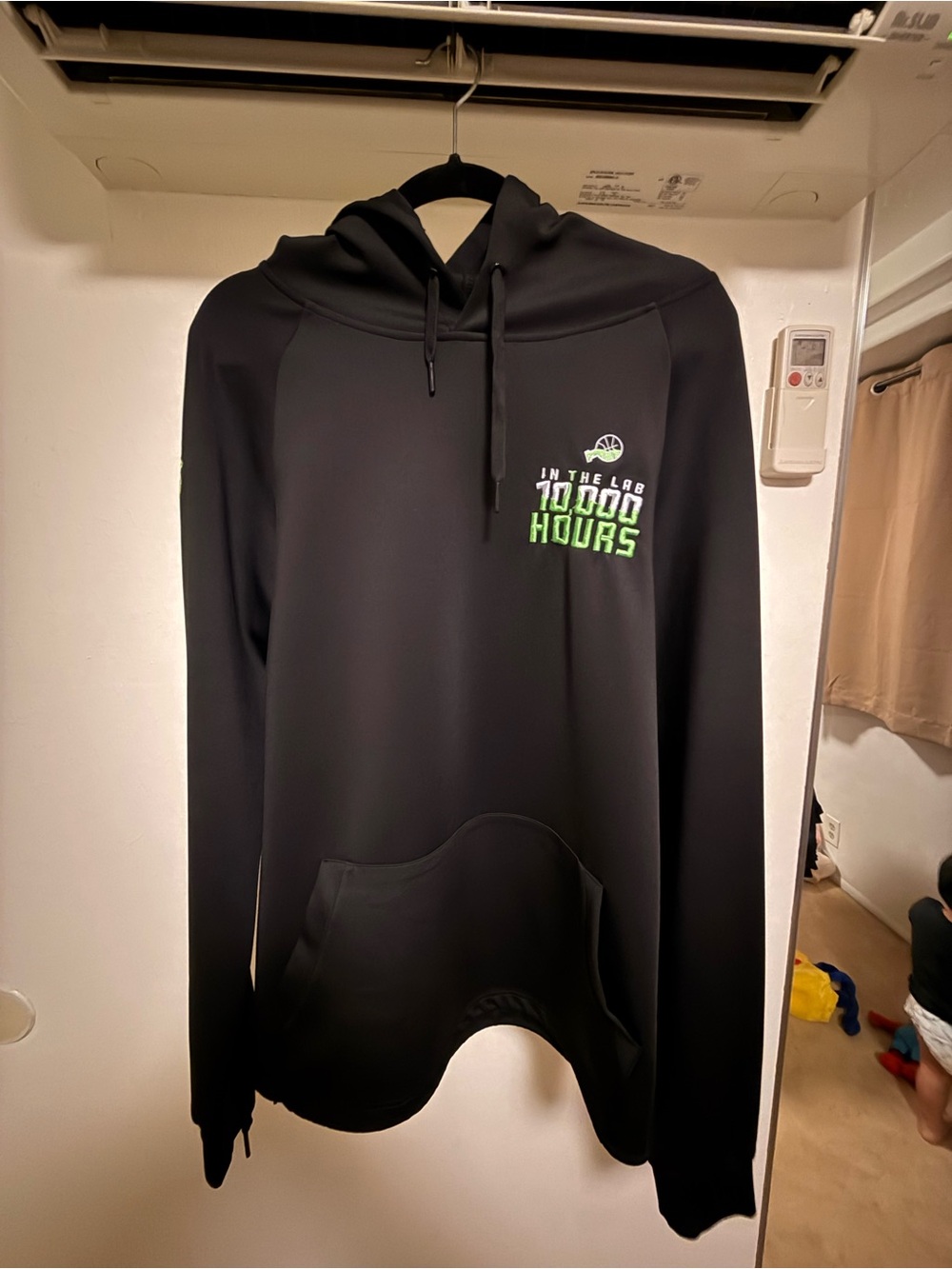 Black Hoodie Jacket with '10,000 Hours' Graphic